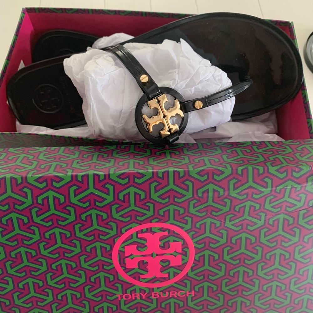 Tory Burch flip flops like new